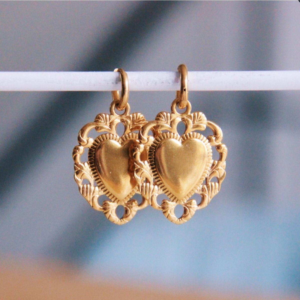 Stainless steel hoop earrings with baroque heart - Selva & Co