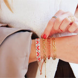 Red and brown Miyuki armband with heart pattern from Bazou, featuring intricate beadwork and a stylish, handcrafted design.
