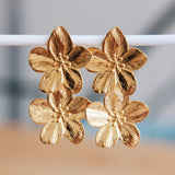 Stainless steel statement earring 2 flowers - gold - Selva & Co