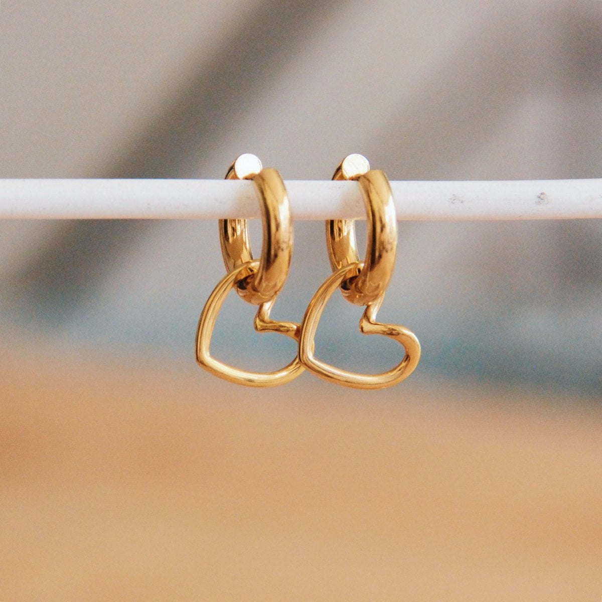 Stainless steel wide creole with open heart - gold - Selva & Co