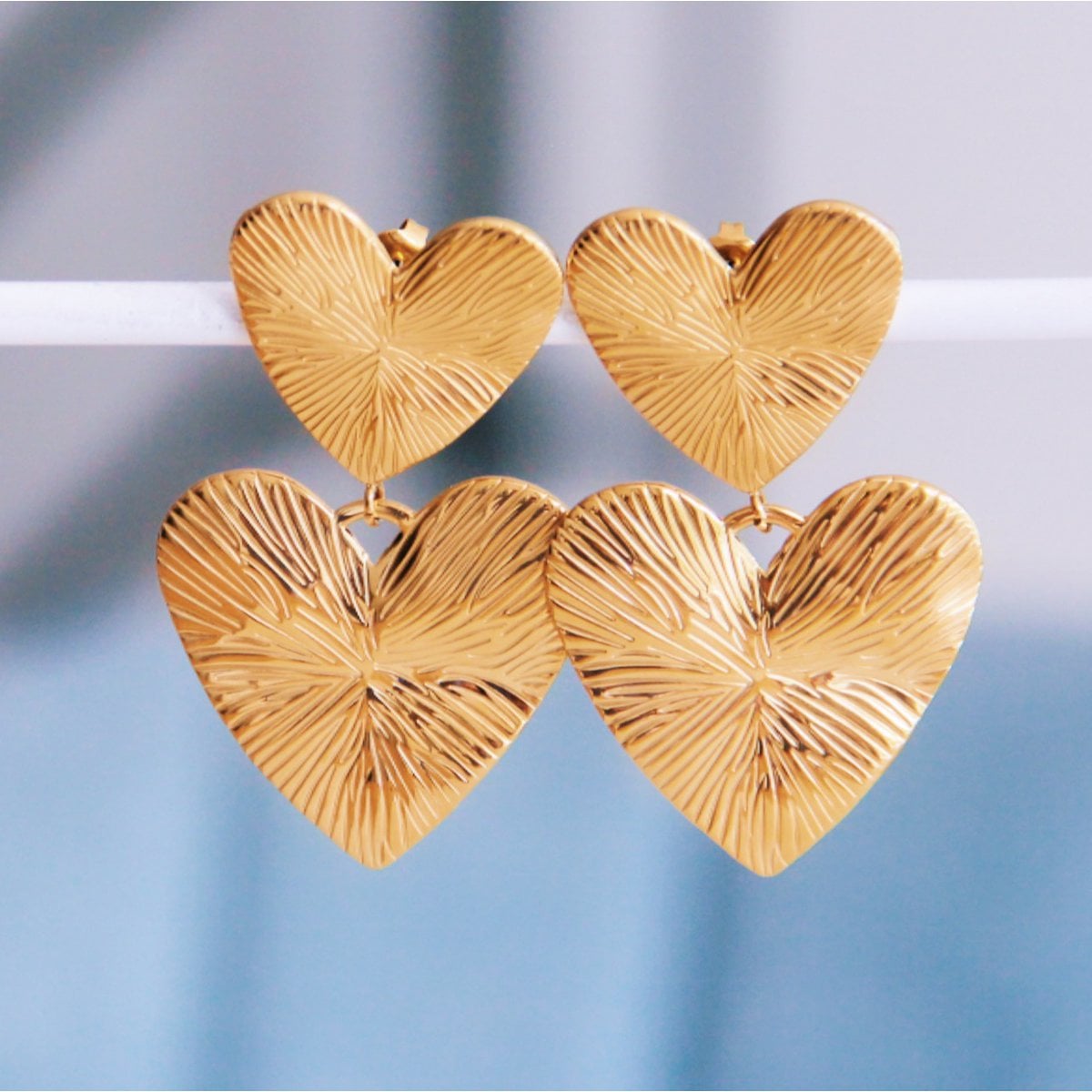 Statement earring 2 hearts - Selva & Co