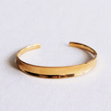 Glanzende open bangle - goud - Selva & Co