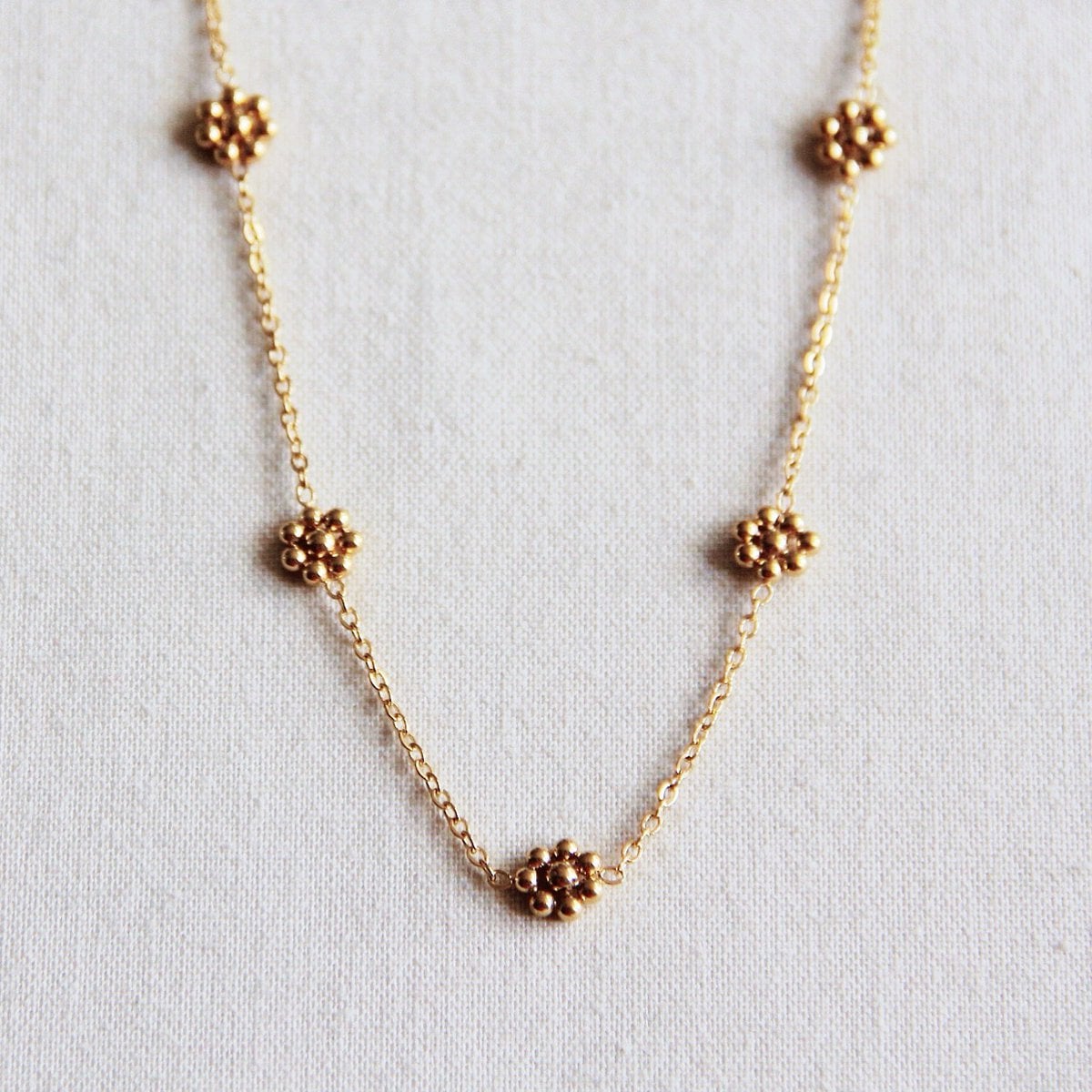 Stainless steel fine daisy flower necklace - gold - Selva & Co