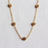 Stainless steel fine daisy flower necklace - gold - Selva & Co