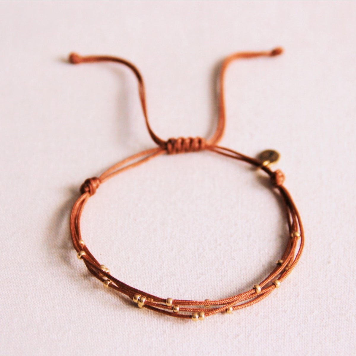 Quadruple satin bracelet with beads - cognac - Selva & Co