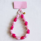 Telefoonsnoer kralen - lichtroze/fuchsia - Selva & Co