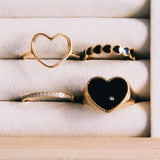 R654: Steel ring mother of pearl heart - Selva & Co