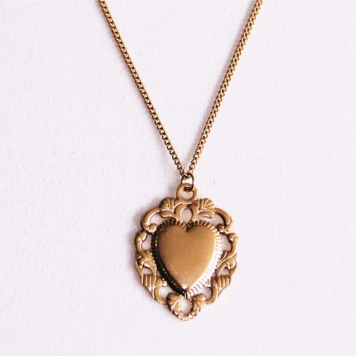 Fijne schakelketting met barok hart - goud - Selva & Co