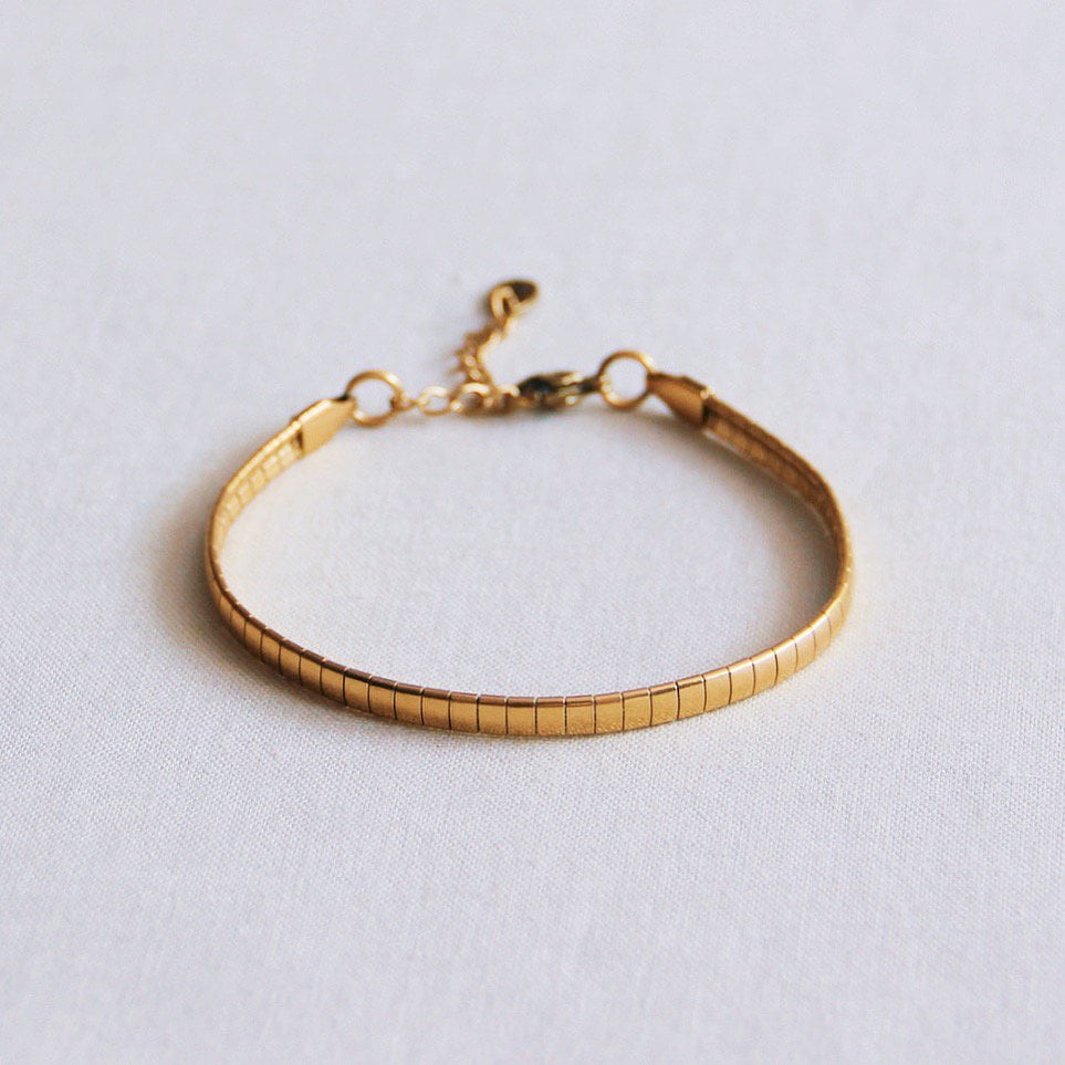 SA811 - Steel flat bracelet striped - gold - Selva & Co