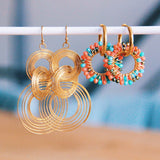 Stainless steel statement earring twisted rings - gold - Selva & Co