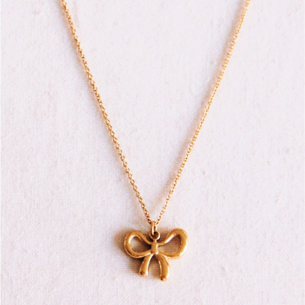 Fijne ketting met strik - goud - Selva & Co