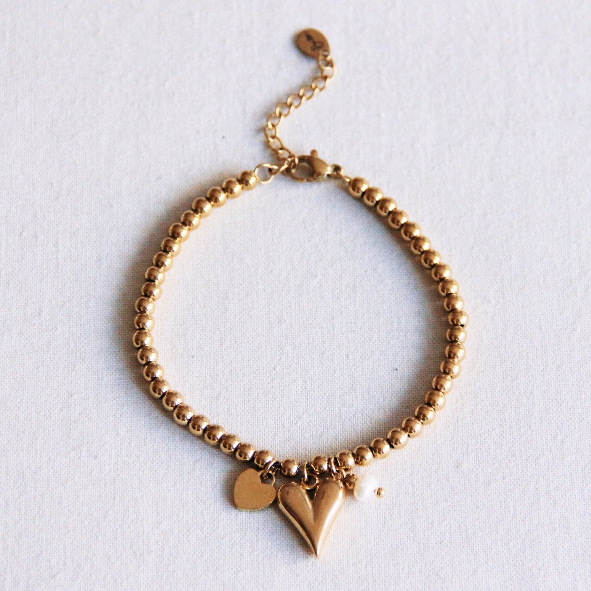Armband met kraaltjes, hartjes en mini parel - Selva & Co