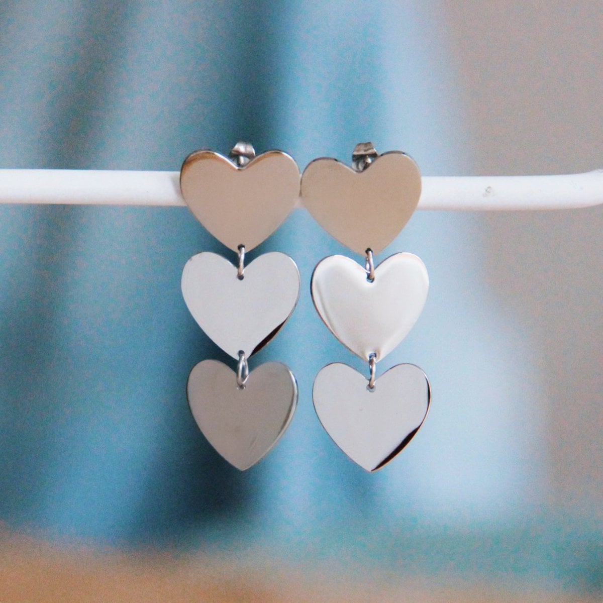Statement oorbel 3 harten – zilver - Selva & Co