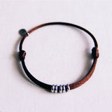 Satijnen armband met ringen – donkerbruin/zilver - Selva & Co