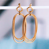Statementoorbel ovale en gedraaide ringen - goud - Selva & Co