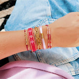Satijnen armband met ringen – lila/goud - Selva & Co