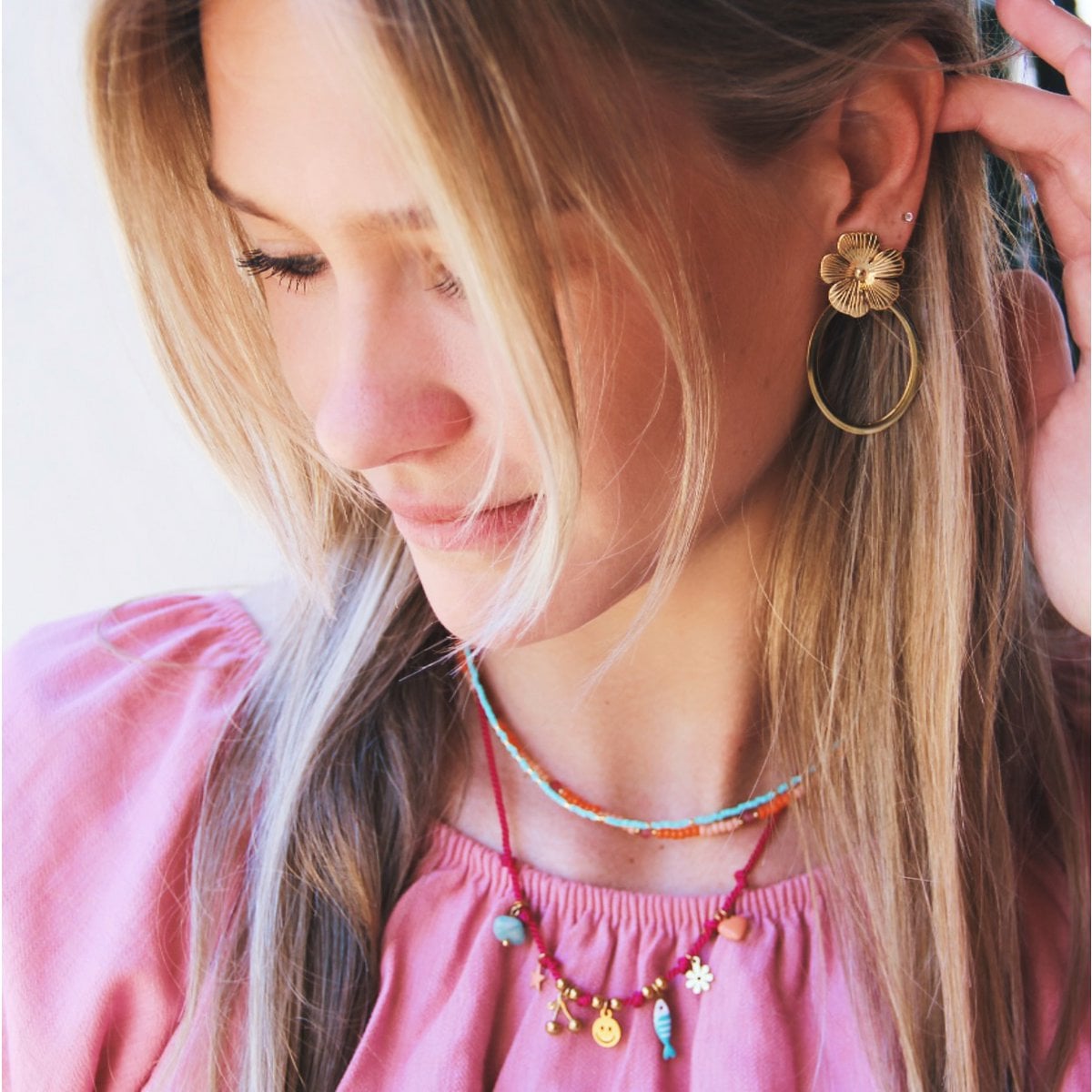 Ovale statement oorringen met bloem - goud - Selva & Co