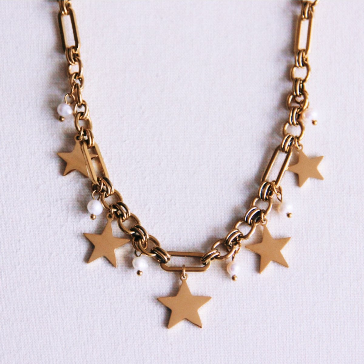 Bedelketting met sterren en kleine parels - goud - Selva & Co