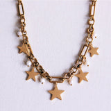 Bedelketting met sterren en kleine parels - goud - Selva & Co