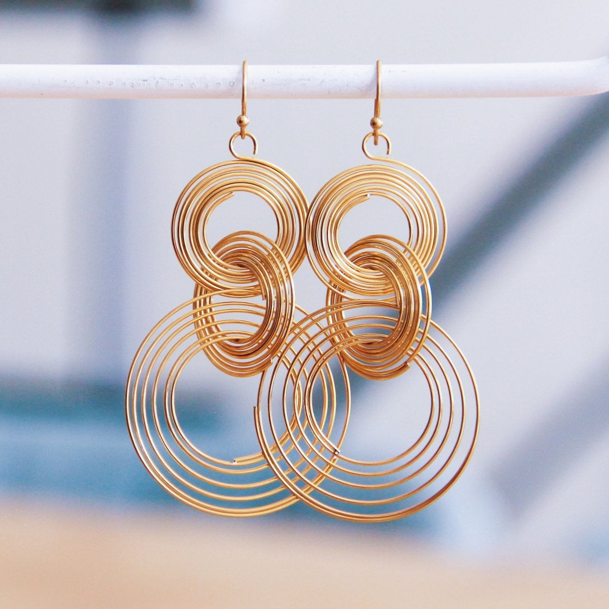 Stainless steel statement earring twisted rings - gold - Selva & Co