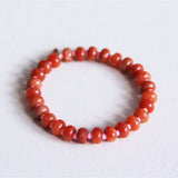 Elastische armband met edelstenen - oranje/roze - Selva & Co