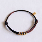 Satijnen armband met ringen – donkerbruin/goud - Selva & Co