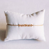 Mooi armbandje met mini hartjes - goud - Selva & Co