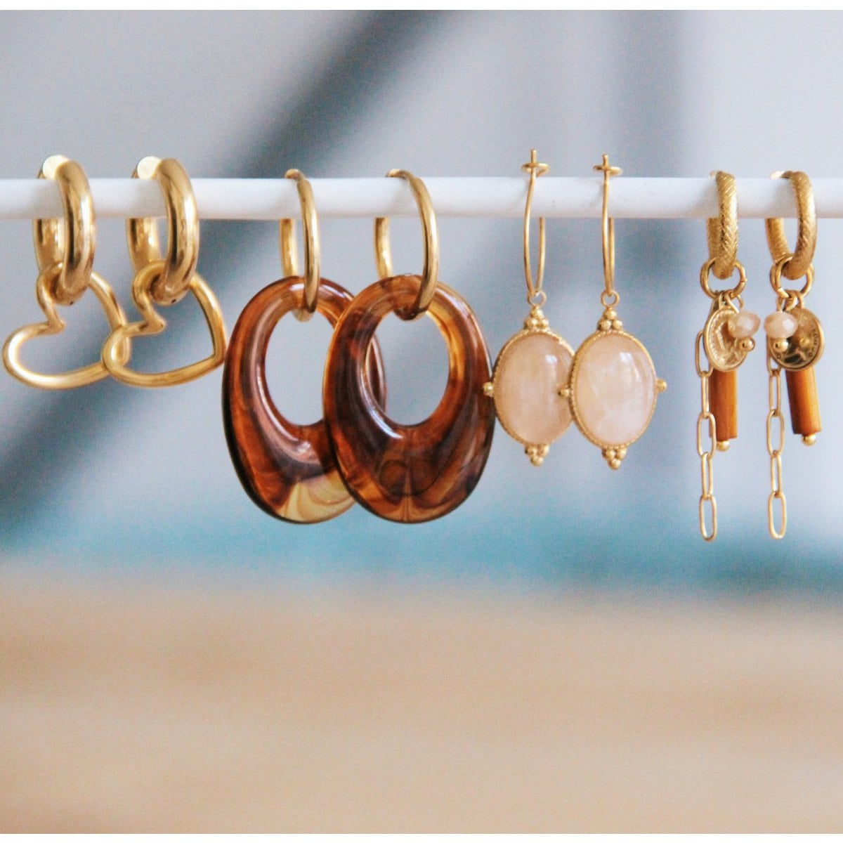 Stainless steel wide creole with open heart - gold - Selva & Co