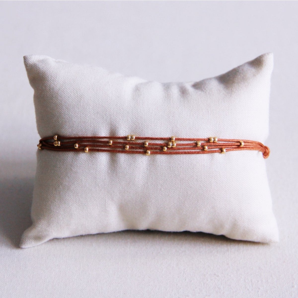 Quadruple satin bracelet with beads - cognac - Selva & Co