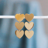 Statement oorbel 3 harten – goud - Selva & Co