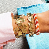 Bangle XL bloemen - goud - Selva & Co