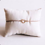 Elastische armband met een gestippeld hart - taupe - Selva & Co