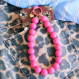 Telefoonsnoer kralen XXL - fuchsia - Selva & Co