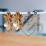 Stainless steel statement earring 2 flowers - gold - Selva & Co