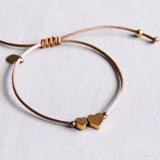 Satin bracelet with small and large heart - taupe / gold - Selva & Co