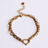 Dubbele schakelarmband met open hart - goud - Selva & Co