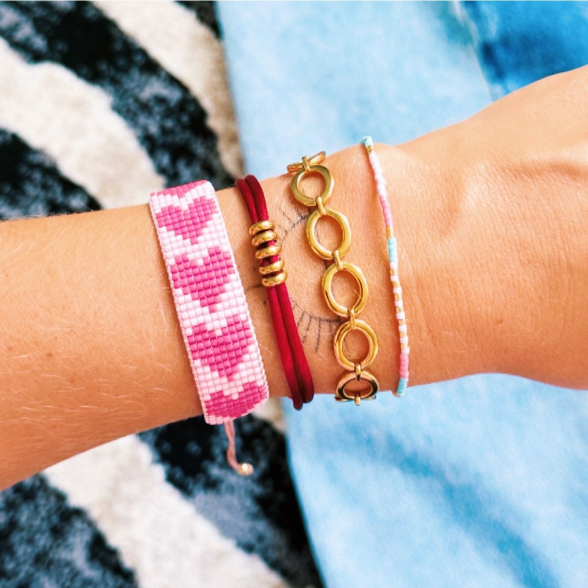 Armband met verweven hart - lila/bordeaux - Selva & Co