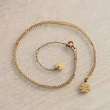 RVS fijne ketting met mini bloem - goud - Selva & Co