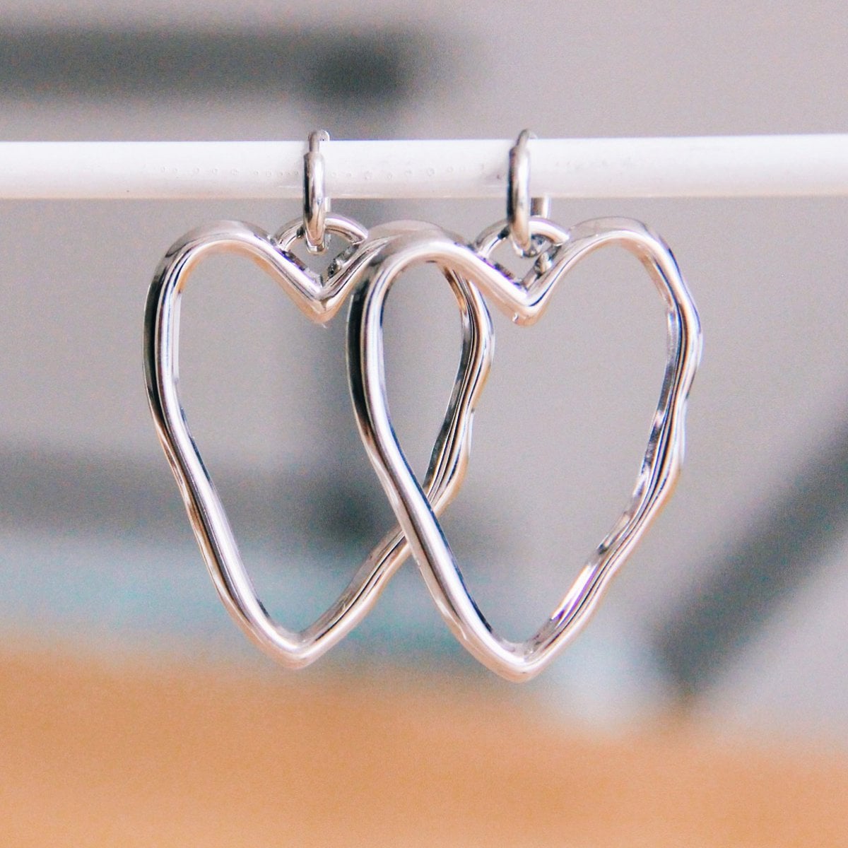 Stainless steel earring with XL open heart - silver - Selva & Co