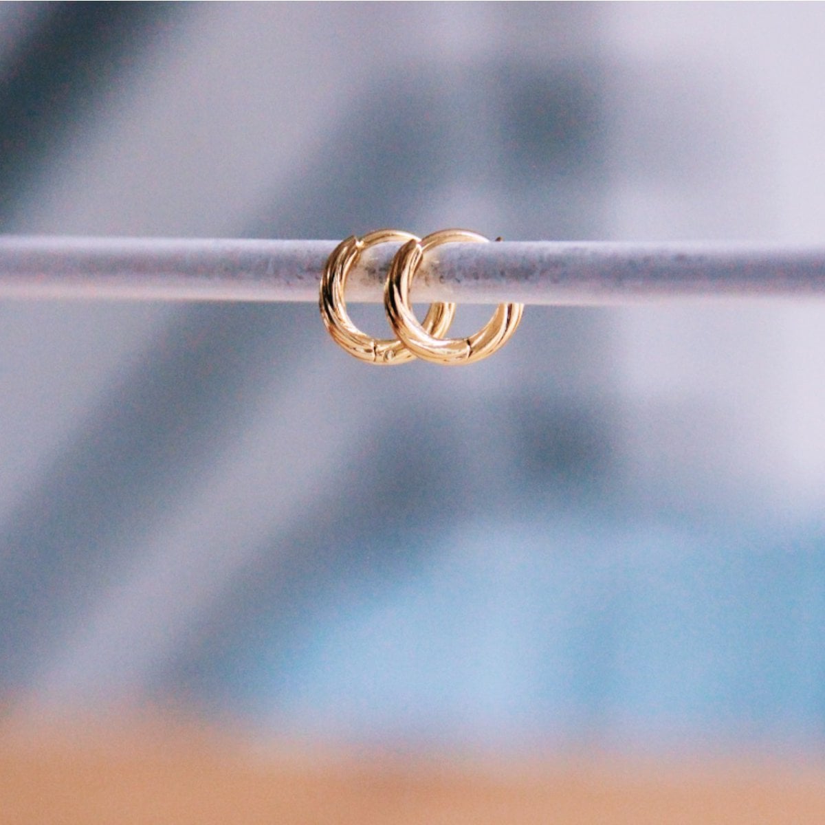 Polished 10mm gold RVS ring from Bazou showing smooth, shiny surface and classic band design.
