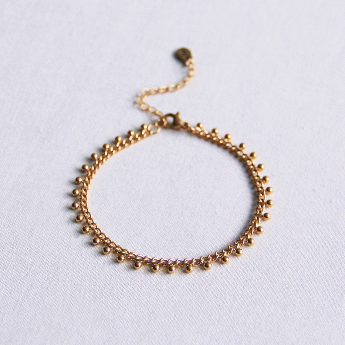 SA834: Steel chain bracelet with balls - gold - Selva & Co