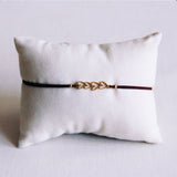 Elastische armband met hartjesplaatje - bruin - Selva & Co