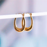 Stainless steel oval earring flared - Selva & Co