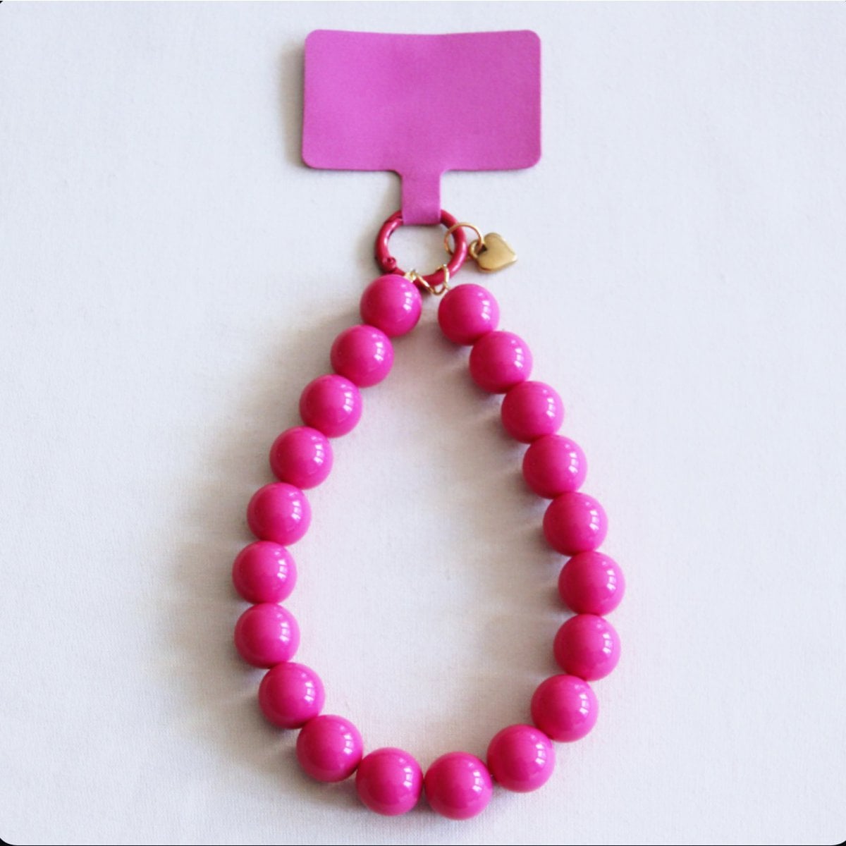 Telefoonsnoer kralen XXL - fuchsia - Selva & Co