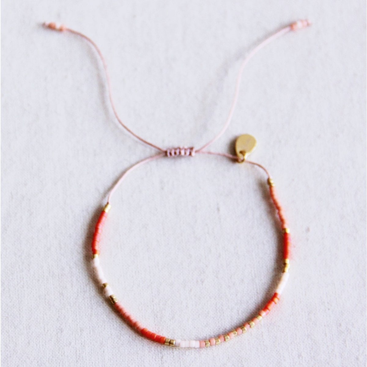 Miyuki- armband naakt/oranje/zalm - Selva & Co