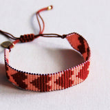Bordeaux and salmon woven Miyuki bead bracelet with heart designs by Bazou, featuring intricate beaded craftsmanship.