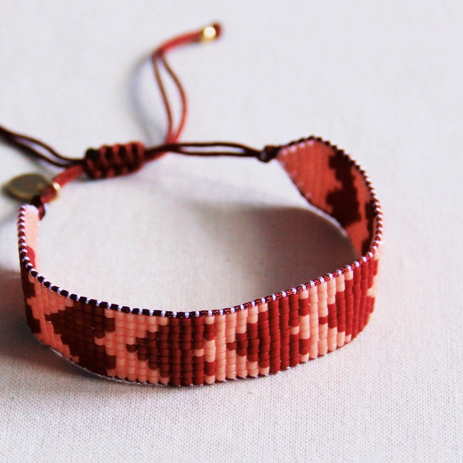 Bordeaux and salmon woven Miyuki bead bracelet with heart designs by Bazou, featuring intricate beaded craftsmanship.